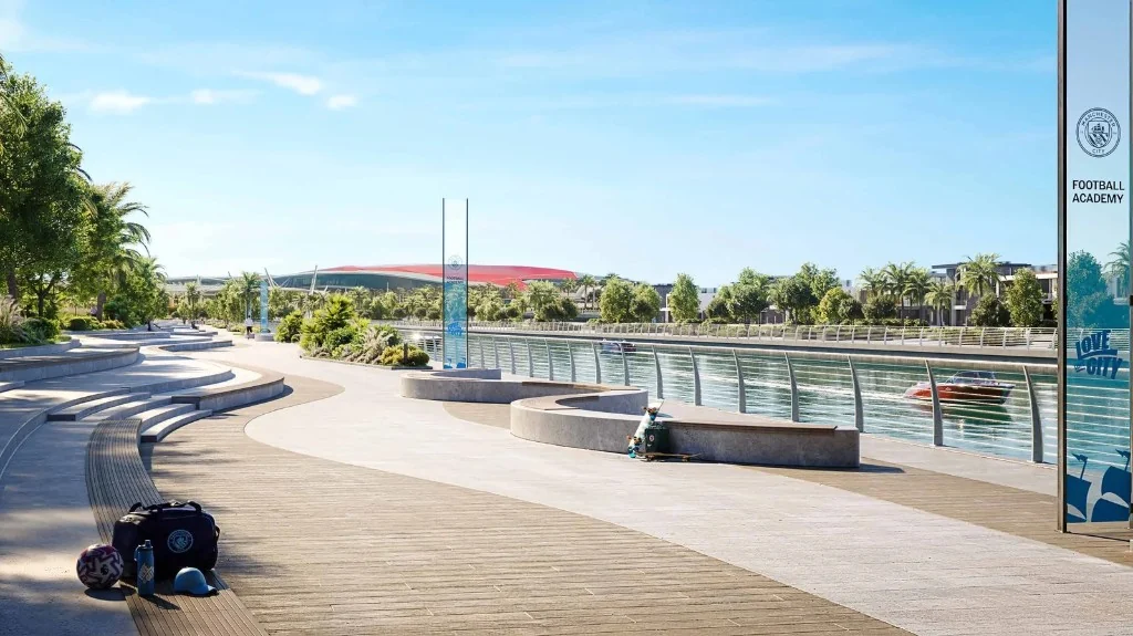 Yas Canal promenade and Manchester City Football Academy signage at Manchester City Yas Residences by Ohana